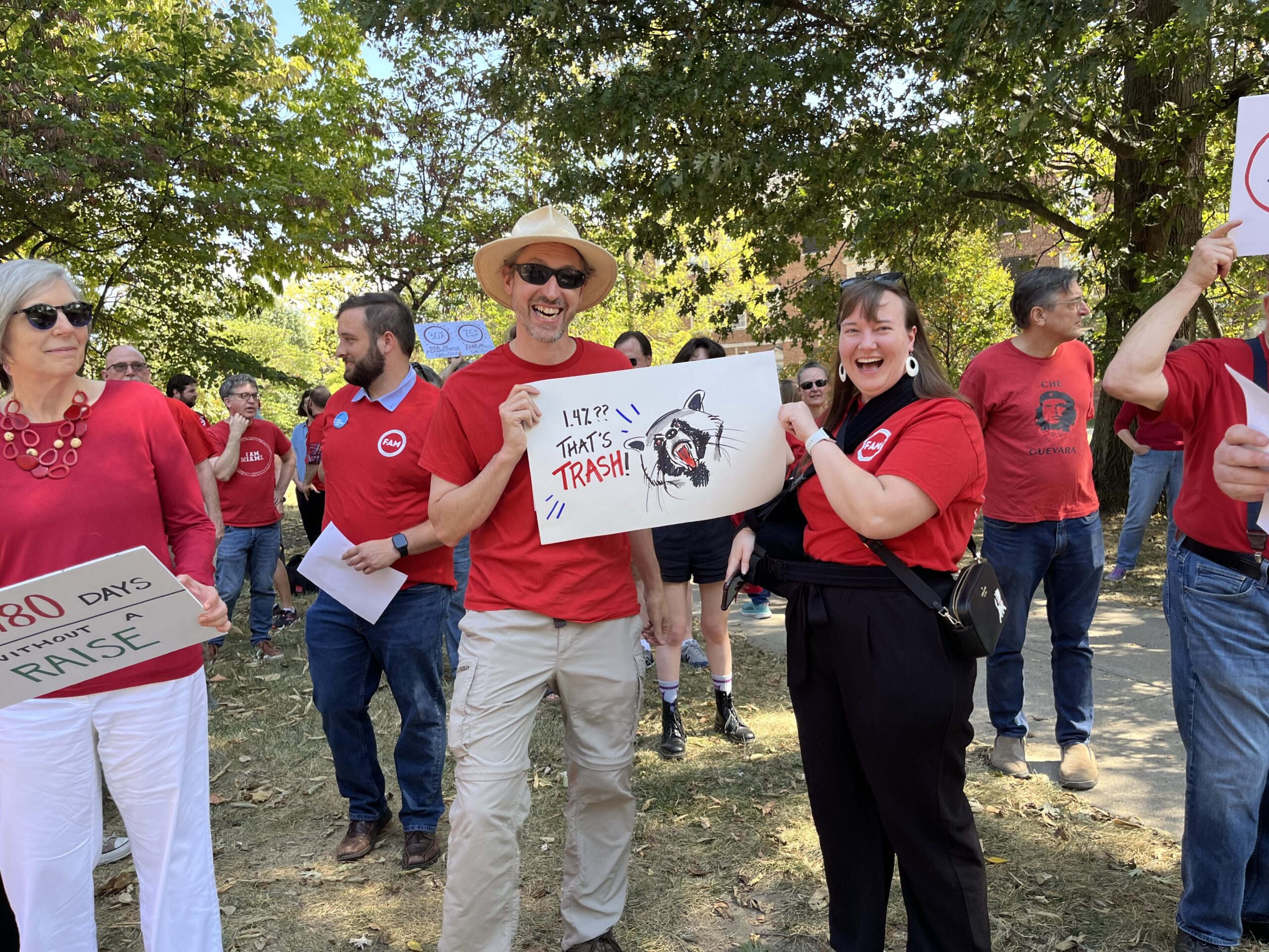 FAM librarians hold signs at the Rally for Raises