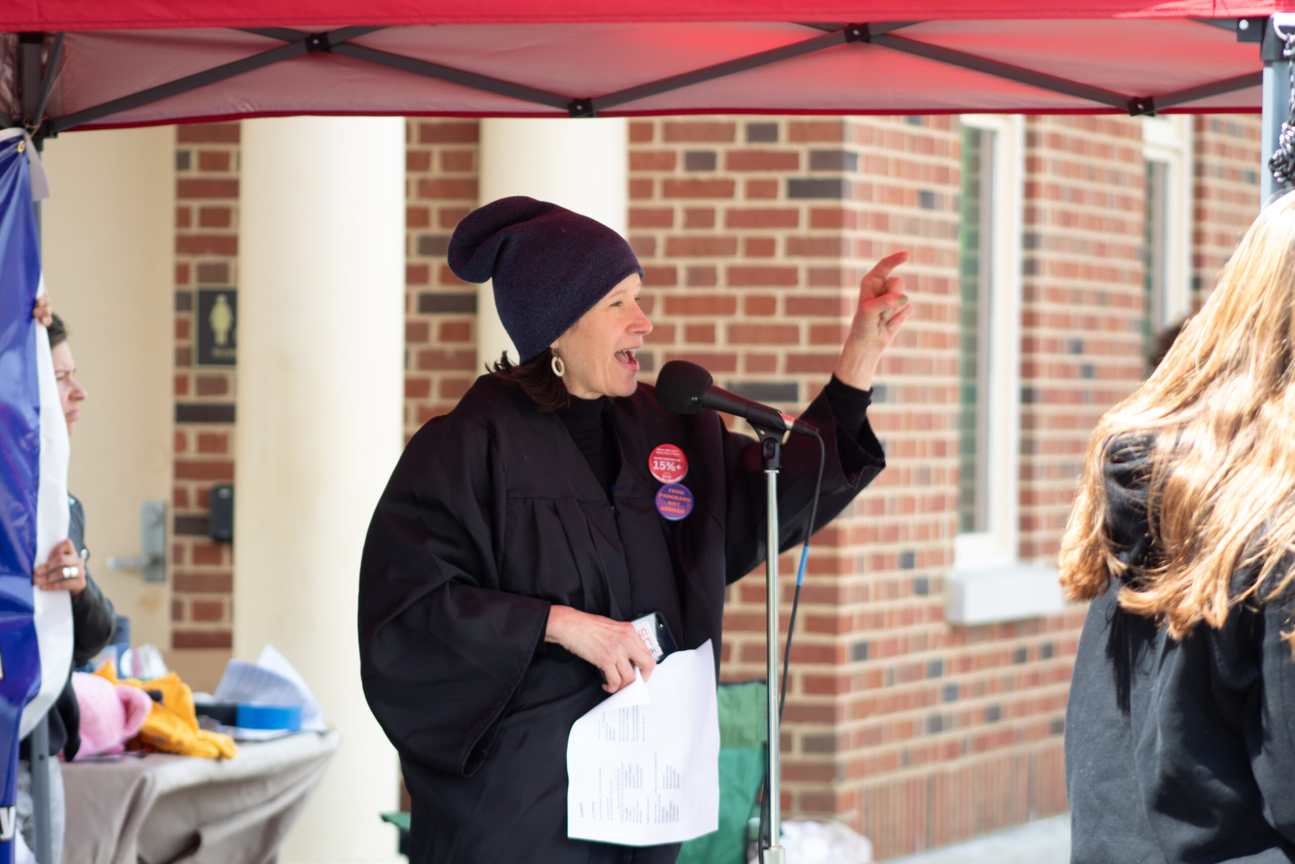 Cathy Wagner speaks at the FAM+Student May Day Action on May 1st.